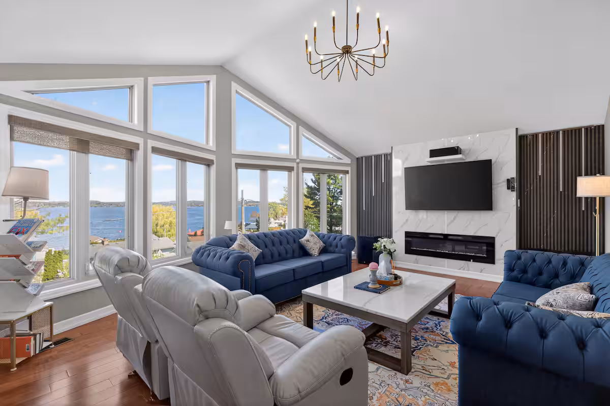 Lake-facing living room at Rice Lake Wellness Villa
